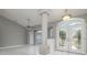 Bright dining room with French doors leading to the backyard at 5366 Hader Rd, North Port, FL 34288