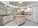 Kitchen with butcher block island and stainless steel appliances at 5366 Hader Rd, North Port, FL 34288