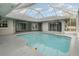 Refreshing screened pool with open view at 5366 Hader Rd, North Port, FL 34288