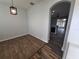 Dining area with wood-look floors and view of kitchen at 7041 Spotted Deer Pl, Riverview, FL 33569