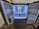 Stainless steel refrigerator with multiple drawers at 7041 Spotted Deer Pl, Riverview, FL 33569