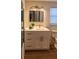 Modern bathroom with white vanity and quartz countertop at 7097 Aberfeldy N Ave, St Petersburg, FL 33709