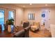 Bright dining room with wooden table and seating, view into bedroom at 7097 Aberfeldy N Ave, St Petersburg, FL 33709