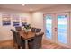 Elegant dining room with hardwood floors and a large wooden table at 7097 Aberfeldy N Ave, St Petersburg, FL 33709