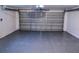 Spacious garage with automatic opener and gray floor at 7097 Aberfeldy N Ave, St Petersburg, FL 33709