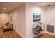 Bright hallway with decorative shelving and seating area at 7097 Aberfeldy N Ave, St Petersburg, FL 33709