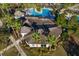 Aerial view of community center with sloped roof at 7119 Peregrina Loop, Wesley Chapel, FL 33545