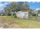 Rustic storage shed with weathered wood siding at 7401 Mount Vernon Rd, Tampa, FL 33625