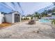 Large backyard with fire pit and shed at 7601 9Th N Ave, St Petersburg, FL 33710