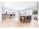 Open concept dining area with wood table and kitchen views at 7601 9Th N Ave, St Petersburg, FL 33710