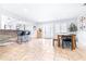 Bright dining area featuring a rustic wood table and bench at 7601 9Th N Ave, St Petersburg, FL 33710