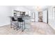 Modern kitchen with marble countertop and breakfast bar at 7601 9Th N Ave, St Petersburg, FL 33710