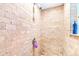 Clean and modern shower with beige tile at 7601 9Th N Ave, St Petersburg, FL 33710