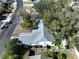 Home aerial view displays the house's new roof, fenced in yard, and overall layout in a serene residential setting at 7923 Leighton Cir, New Port Richey, FL 34654