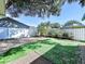 Green backyard space with full fence and landscaping to add a sense of privacy and beauty at 7923 Leighton Cir, New Port Richey, FL 34654