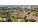 Aerial view showing townhouses and a waterway; desirable location at 820 Date Palm Ln, St Petersburg, FL 33707