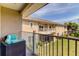 Private balcony overlooking backyard and neighboring houses at 820 Date Palm Ln, St Petersburg, FL 33707