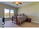 Bright bedroom with a double bed, large window, and carpeted floor at 820 Date Palm Ln, St Petersburg, FL 33707