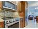 Kitchen features stainless steel appliances and granite countertops at 820 Date Palm Ln, St Petersburg, FL 33707