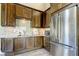 Well-equipped kitchen featuring stainless steel appliances and granite at 820 Date Palm Ln, St Petersburg, FL 33707