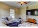 Relaxing living room with sectional sofa and large windows at 820 Date Palm Ln, St Petersburg, FL 33707