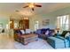 Comfortable living room with sectional sofa and access to backyard at 820 Date Palm Ln, St Petersburg, FL 33707