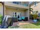 Brick patio with outdoor furniture and a covered area at 820 Date Palm Ln, St Petersburg, FL 33707