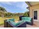 Spacious patio with seating area and backyard view at 820 Date Palm Ln, St Petersburg, FL 33707