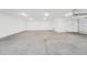 Clean and bright garage featuring polished concrete floor at 8631 5Th Street North, St Petersburg, FL 33702