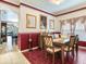 Dining area with wooden table and chairs, near kitchen at 9516 Cypress Harbor Dr, Gibsonton, FL 33534