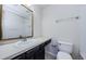 Clean bathroom with single sink vanity, toilet, and shower/tub at 10425 Westpark Preserve Blvd, Tampa, FL 33625