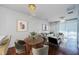 Elegant dining area with wood table and modern chairs at 10425 Westpark Preserve Blvd, Tampa, FL 33625