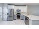 Empty dining room with hardwood floors and a chandelier at 10425 Westpark Preserve Blvd, Tampa, FL 33625