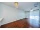 Empty dining room with hardwood floors and a chandelier at 10425 Westpark Preserve Blvd, Tampa, FL 33625