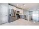 Modern kitchen with stainless steel appliances and gray cabinets at 10425 Westpark Preserve Blvd, Tampa, FL 33625