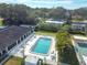 Aerial view of community pool, shuffleboard, and clubhouse at 11200 102Nd Ave # 138, Seminole, FL 33778