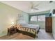 Bedroom with double bed, dresser, and ceiling fan at 11200 102Nd Ave # 138, Seminole, FL 33778