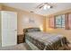 Bedroom with a double bed, nightstand, and ceiling fan at 11200 102Nd Ave # 138, Seminole, FL 33778