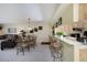 Bright dining area with glass table and metal chairs at 124 W Cypress Ct, Oldsmar, FL 34677