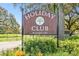 Holiday Club community sign with website address at 13833 Vacation Ln, Odessa, FL 33556