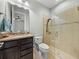 Bathroom featuring a glass enclosed shower and granite vanity top at 1525 Banner Elk St, Valrico, FL 33594