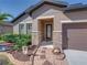 Close up of front door with stone features and nice landscaping at 1525 Banner Elk St, Valrico, FL 33594