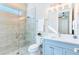 Spa-like bathroom with a walk-in shower and a modern vanity at 1818 4Th E St, Palmetto, FL 34221