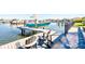 Private boat dock with chairs overlooking the water at 1818 4Th E St, Palmetto, FL 34221