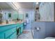 Spa-like bathroom with a walk-in shower and double vanity at 19029 Us Highway 19 N # 32B, Clearwater, FL 33764