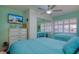 Bright bedroom with two twin beds and dresser at 19029 Us Highway 19 N # 32B, Clearwater, FL 33764