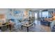 Living room with water views and coastal decor at 19029 Us Highway 19 N # 32B, Clearwater, FL 33764