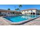 Inviting community swimming pool with patio at 19029 Us Highway 19 N # 32B, Clearwater, FL 33764