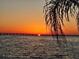 Stunning sunset view over the water at 19029 Us Highway 19 N # 32B, Clearwater, FL 33764