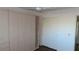 Spacious bedroom closet with built-in shelves at 2020 N World Parkway Blvd # 12, Clearwater, FL 33755